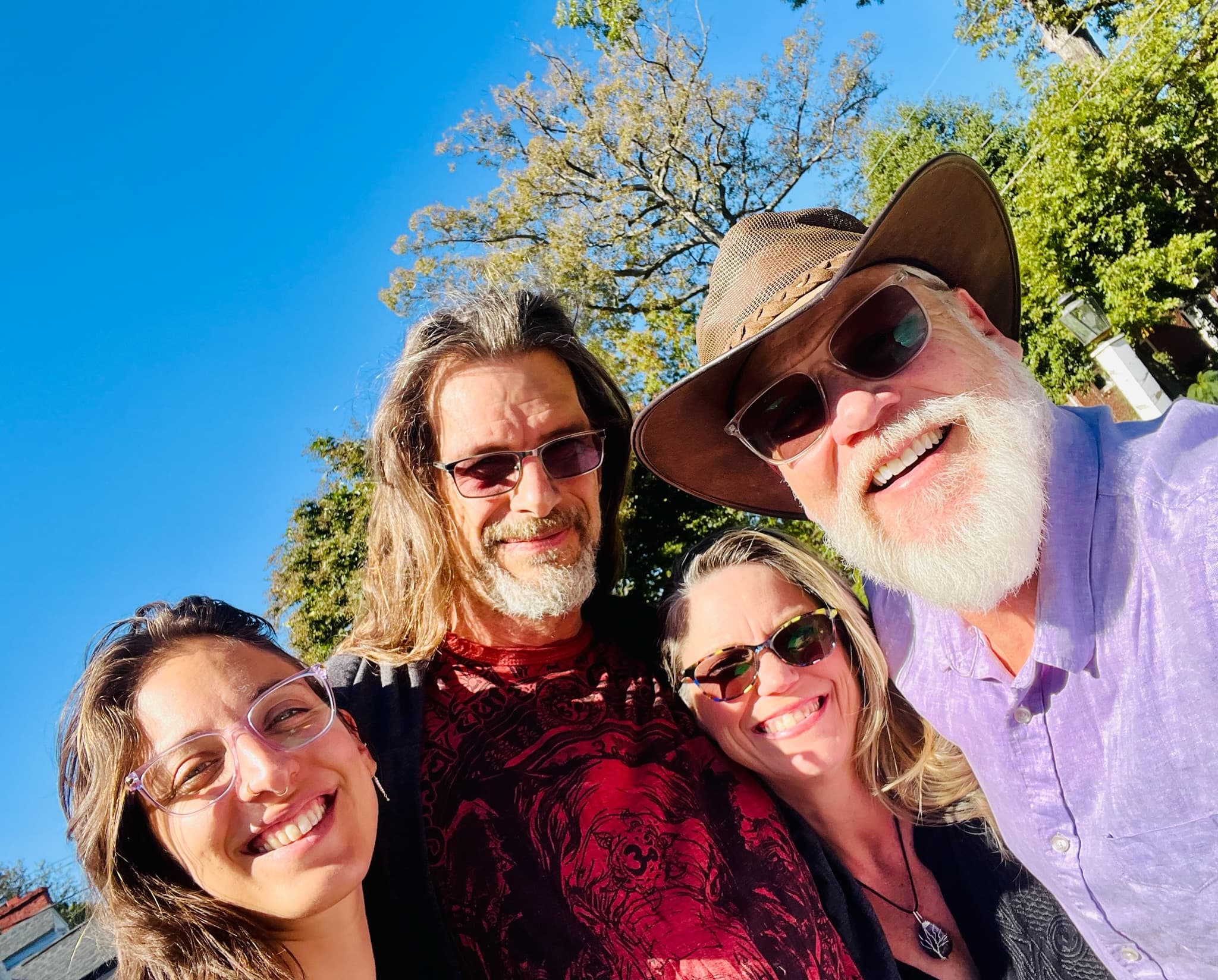 Four friends selfie outdoors