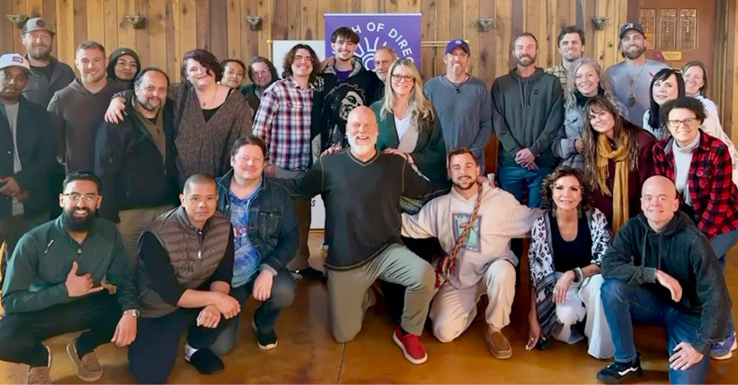 Large group photo at the lodge